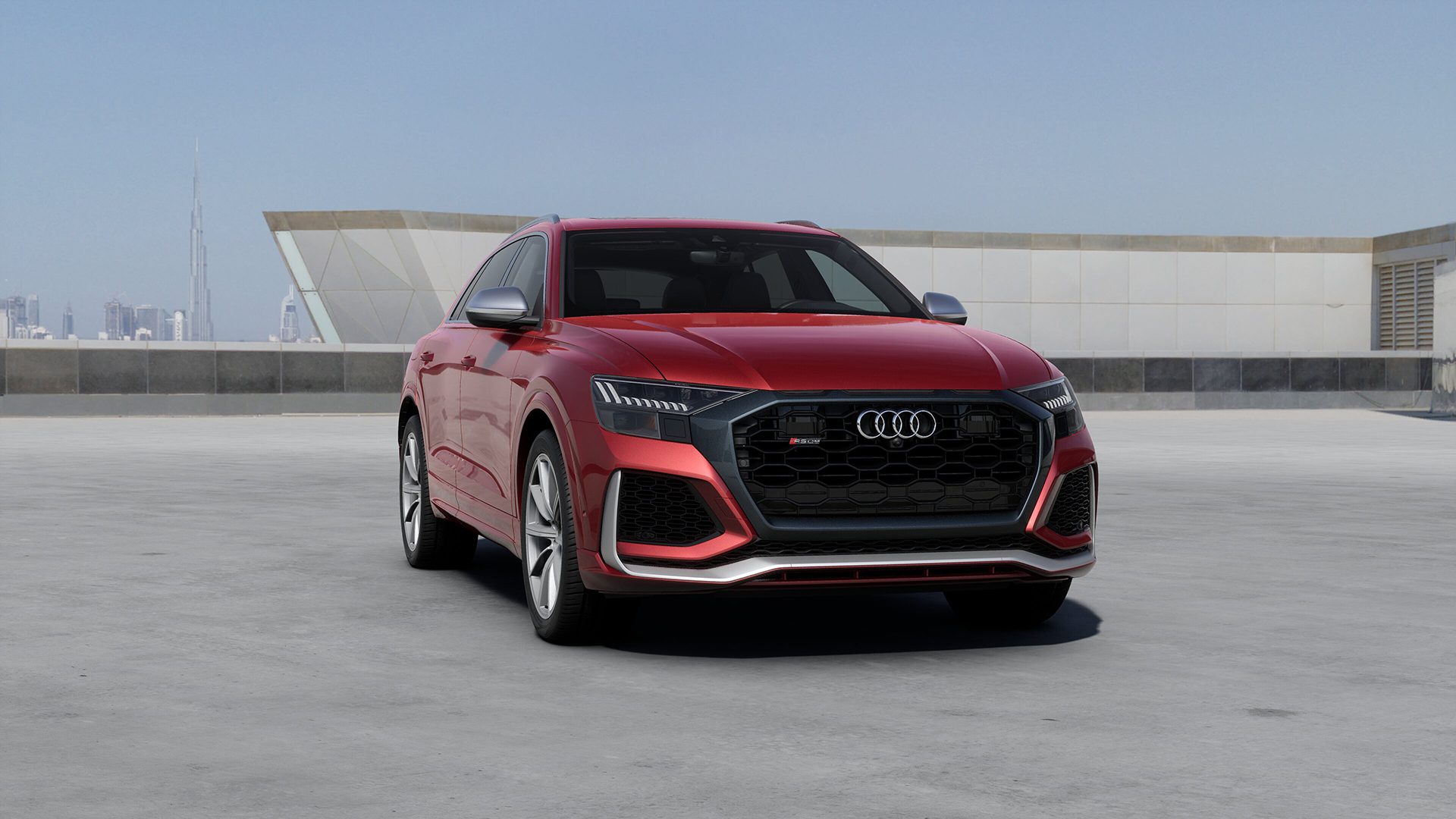 Front view of a 2024 red Audi RSQ8