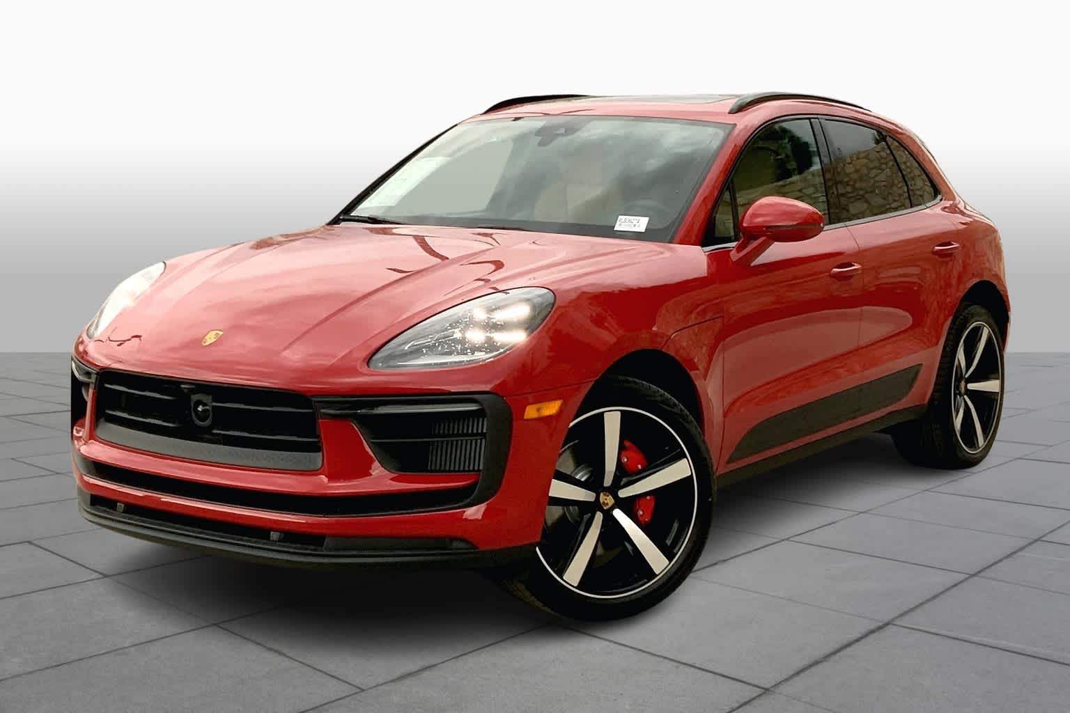 Front-angled view of a red Porsche Macan S