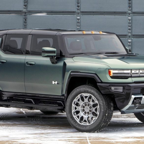 Front-angled view of a green 2024 GMC Hummer SUV