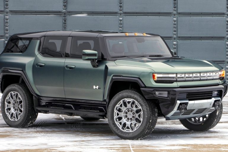 Front-angled view of a green 2024 GMC Hummer SUV