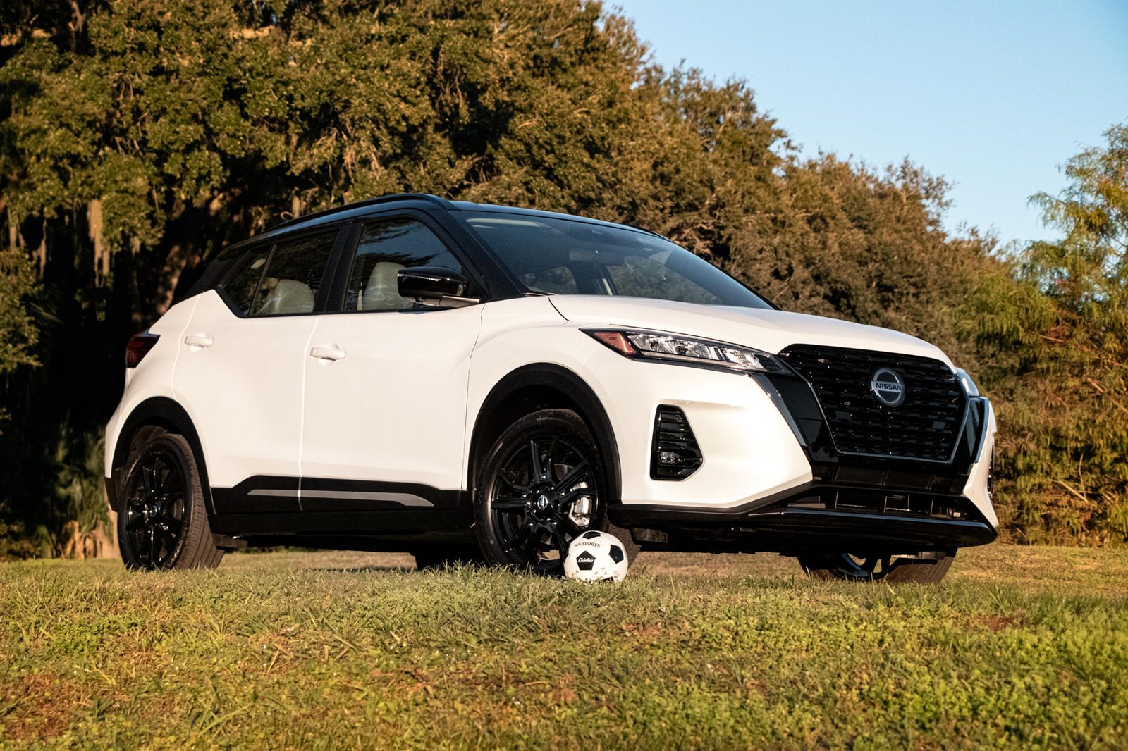 Front-angled view of a white 2024 Nissan Kicks