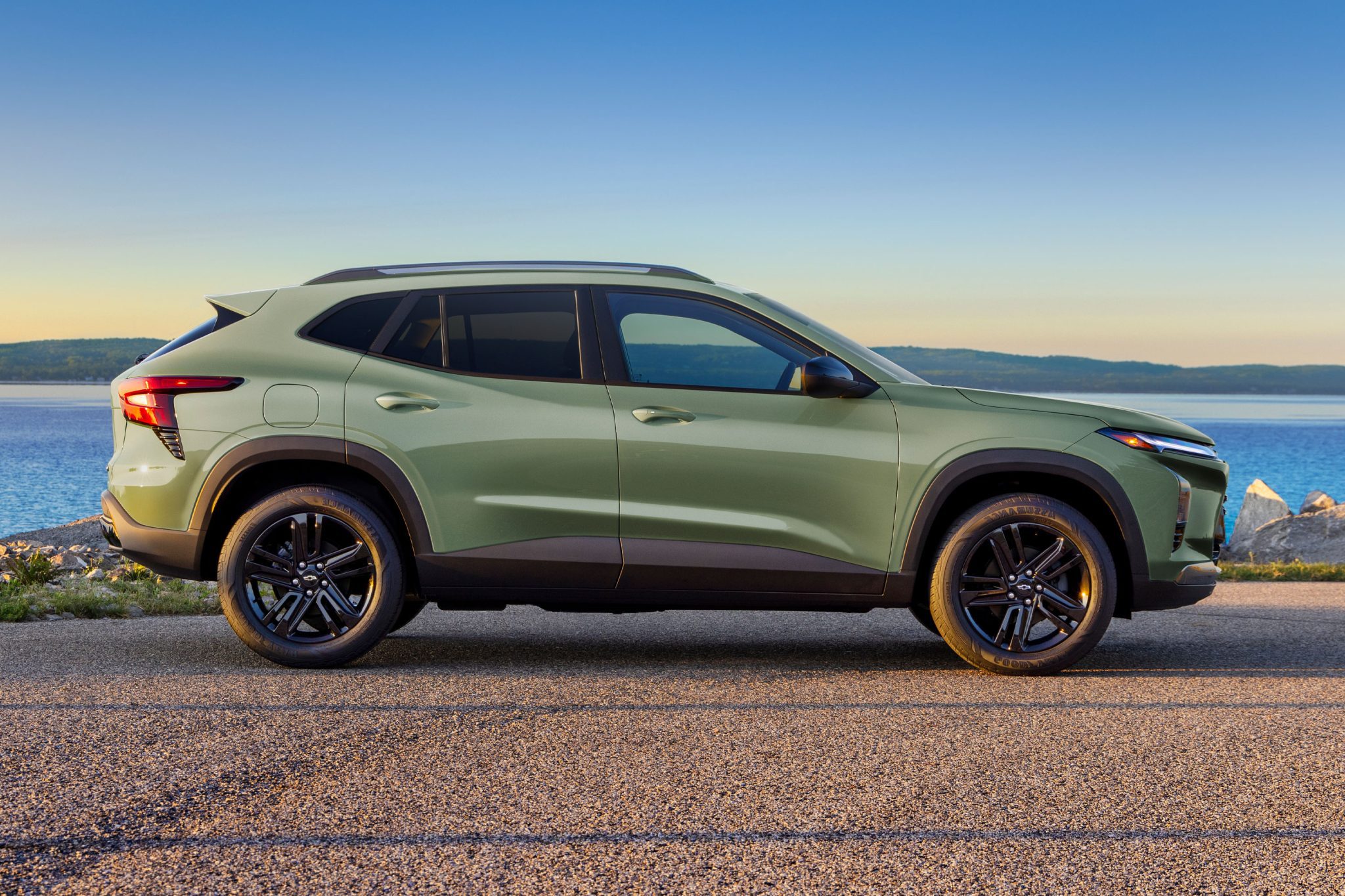 Side profile of a green 2024 Chevrolet Trax