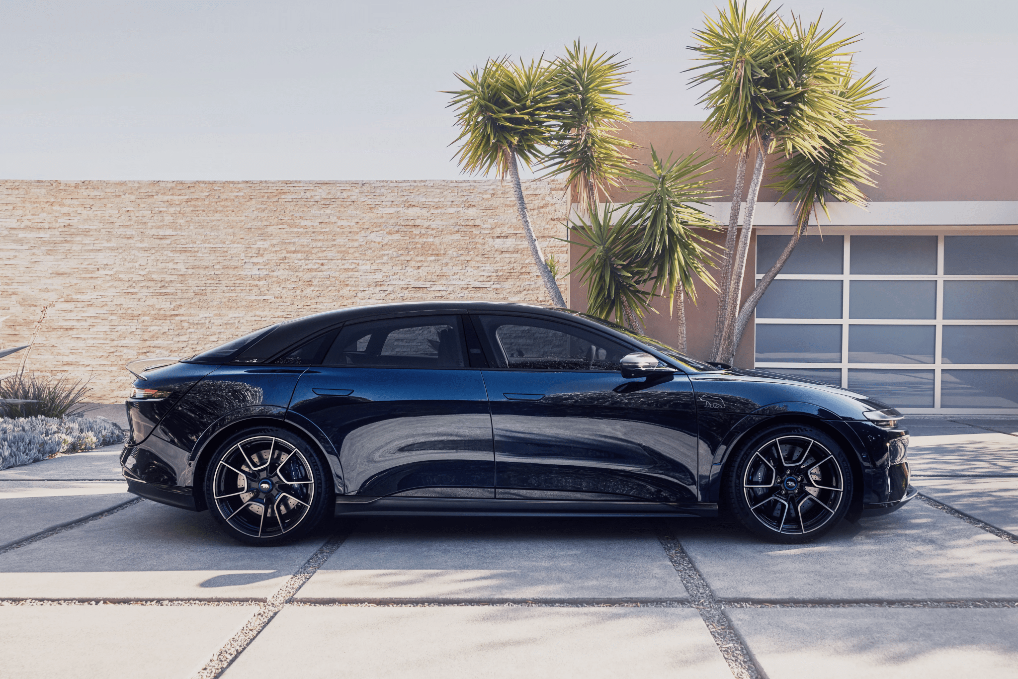 Side view of a 2024 blue Lucid Air Sapphire