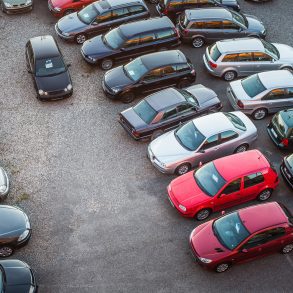 overhead shot of cars in a dealer lot
