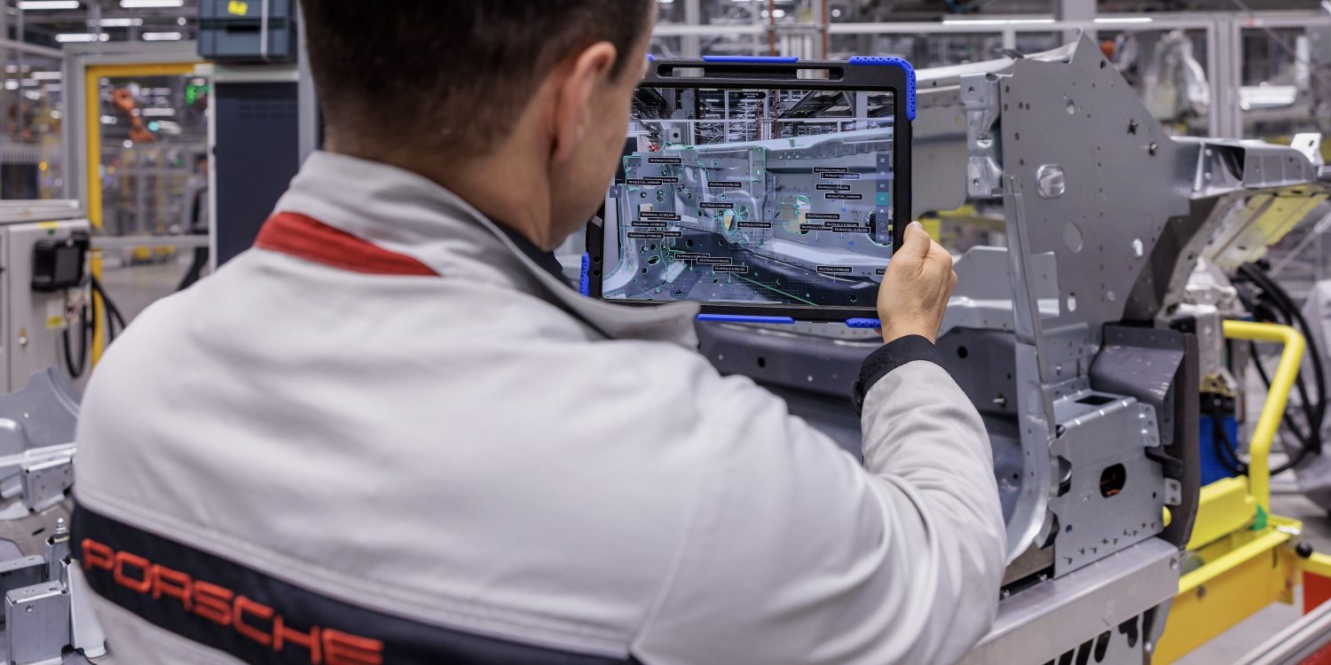 Porsche woker at body construction facility, Porsche plant Leipzig.